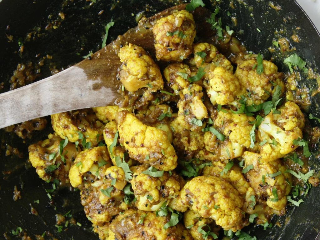 a pan of cauliflower in pickling spices