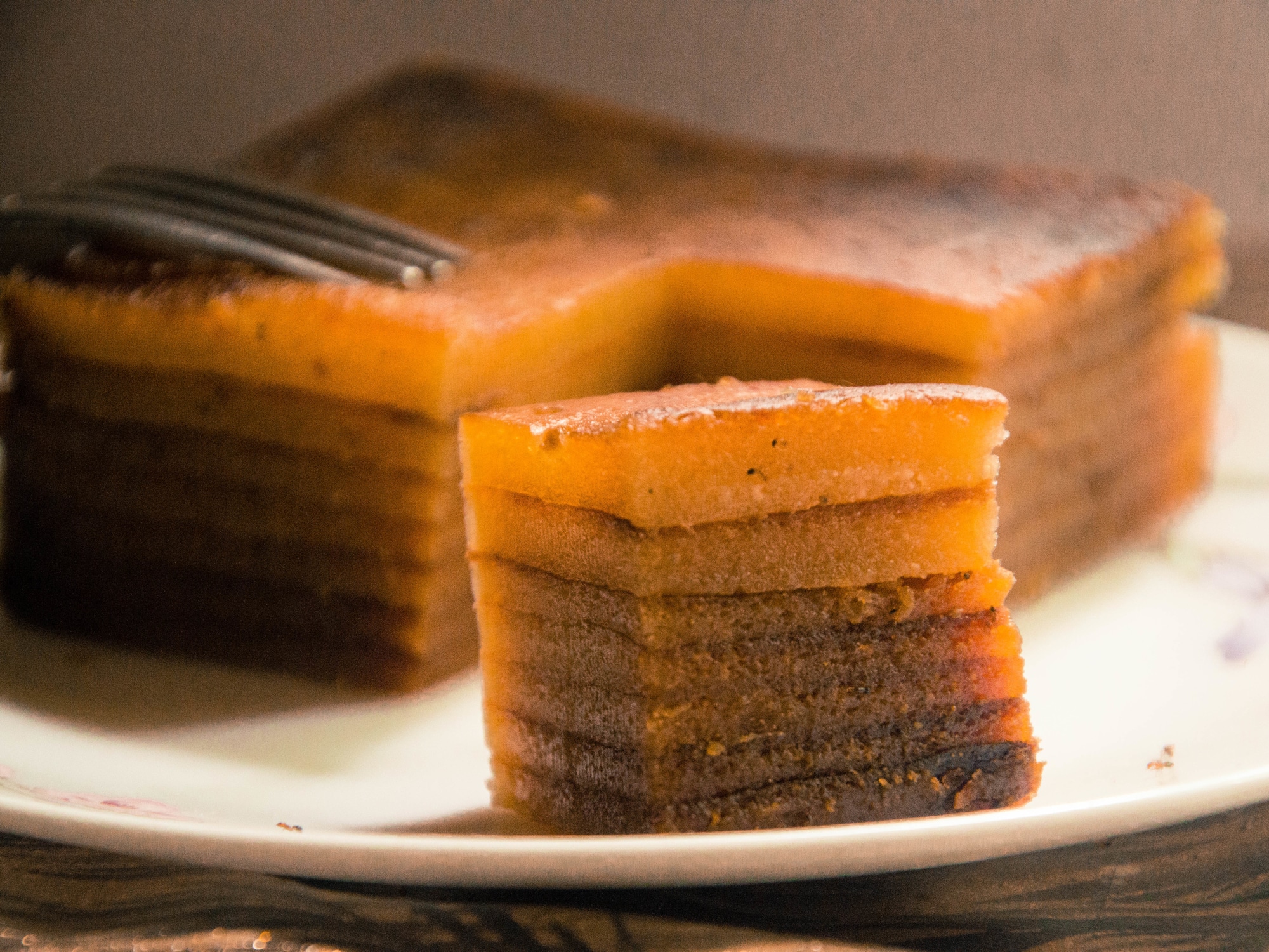 a portuguese layer cake, with a single serve in forground