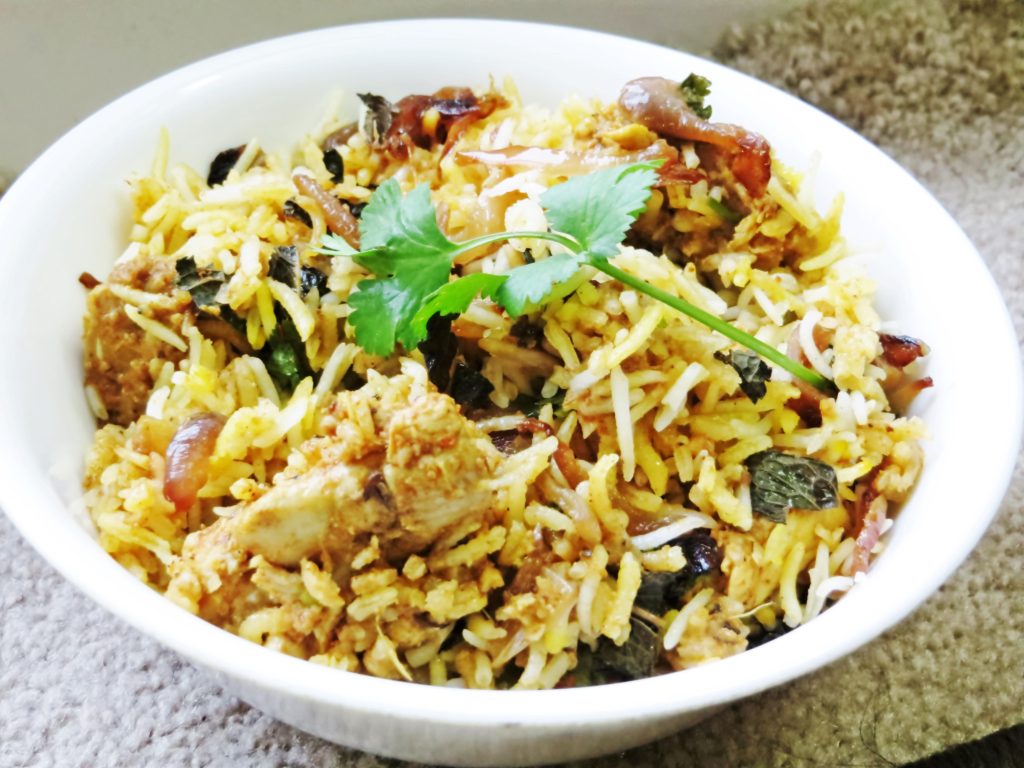 a bowl of Rajastani chicken biryani