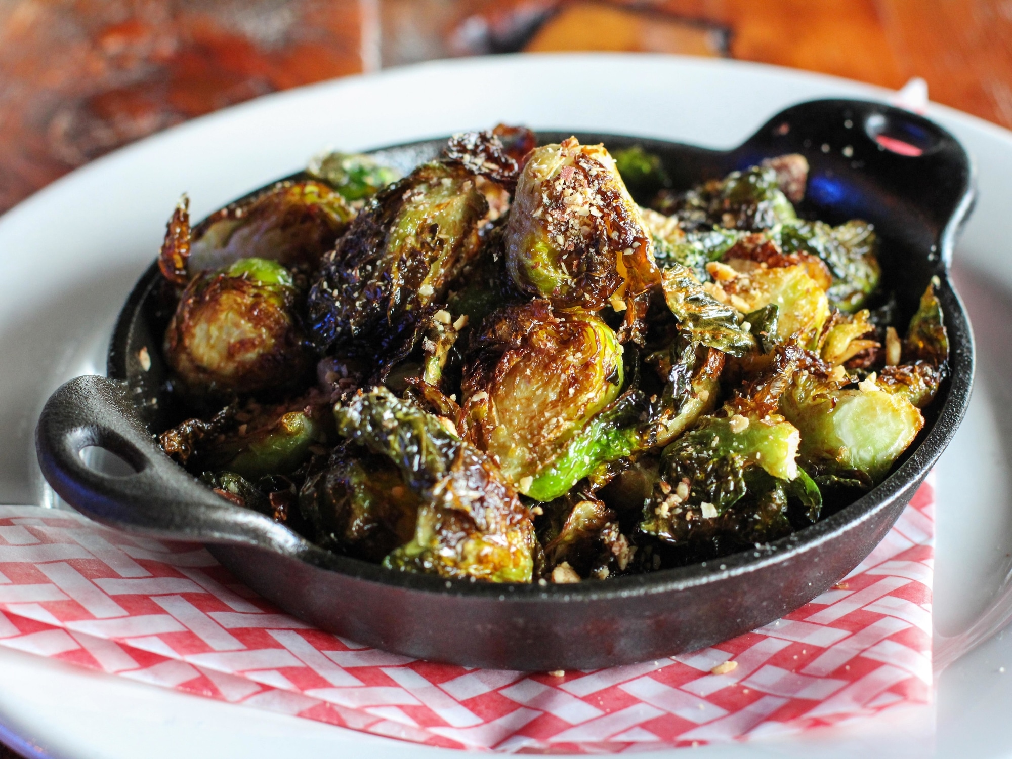 a serving dish, filled with pan-roasted brussel sprouts
