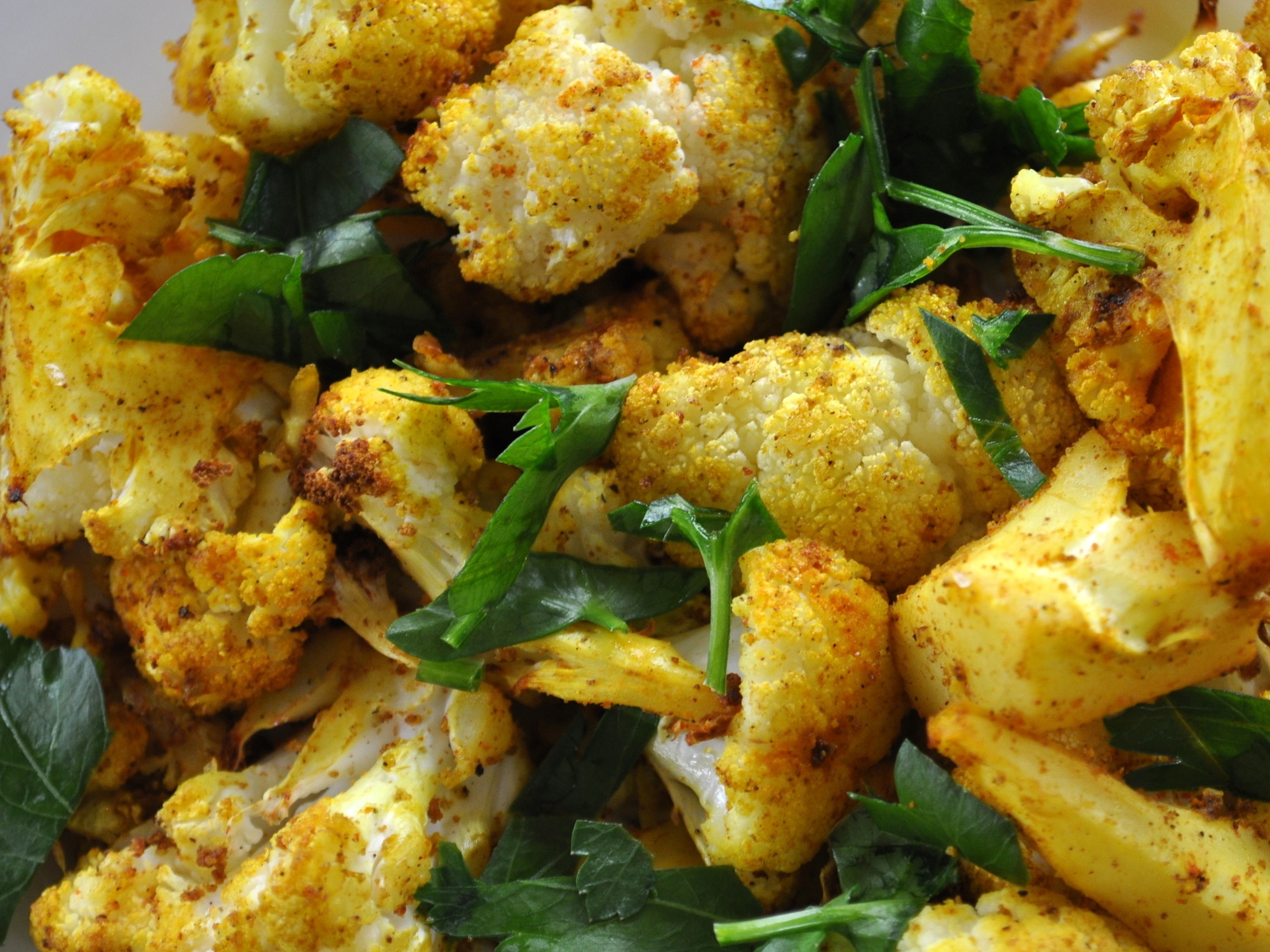 a serving dish of roasted cauliflower florets