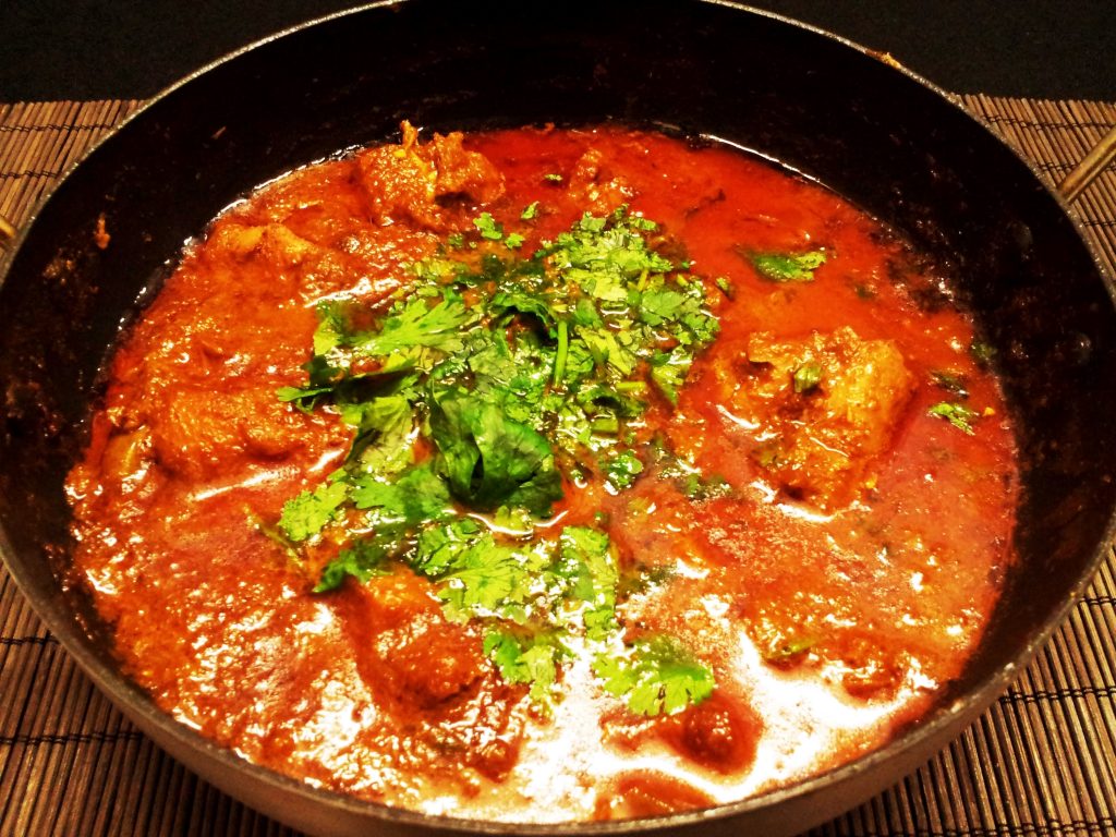 a bowl of southern chicken korma