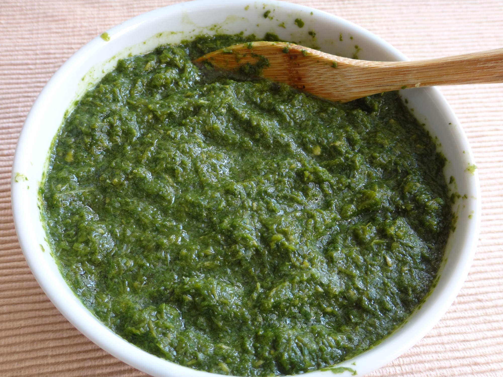 a bowl of green chutney