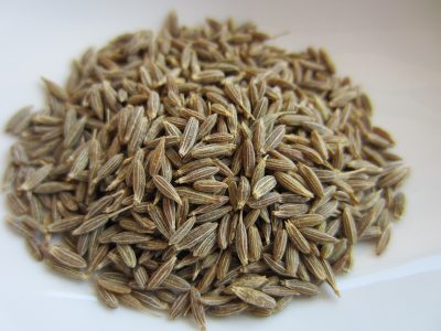 a heap of cumin seeds