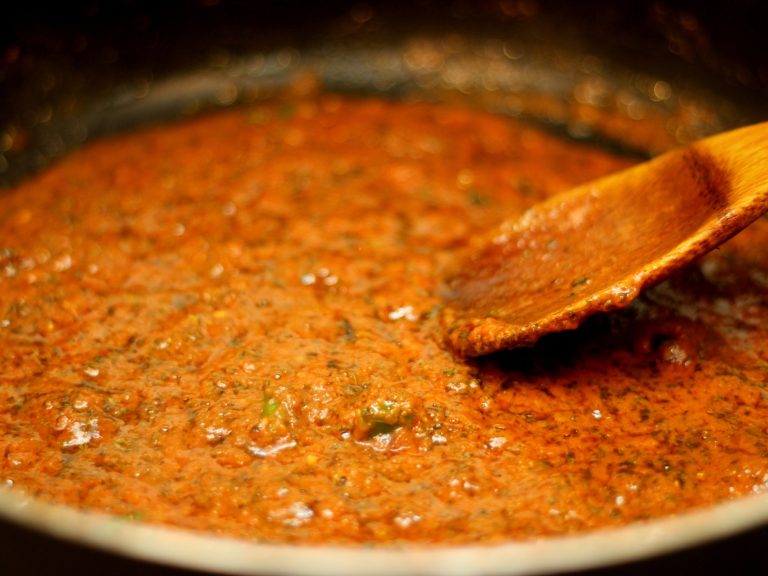 curry house base sauce in pan being cooked