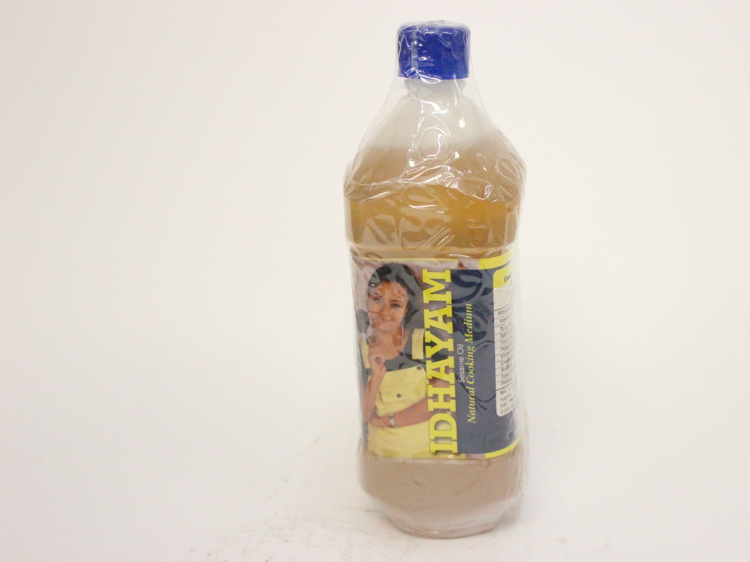 a bottle of gingelly oil