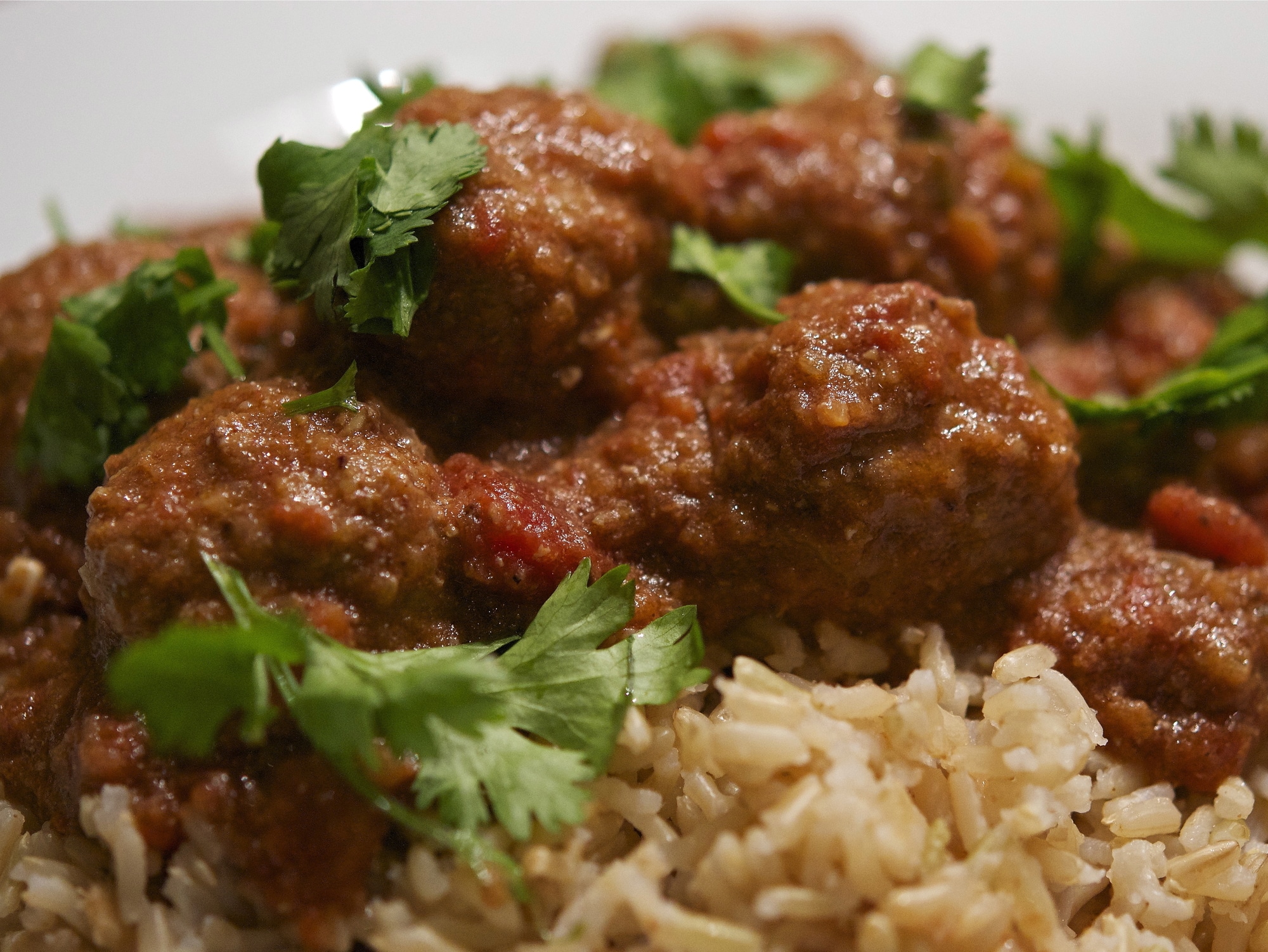 lamb kofta curry on a bed of rice