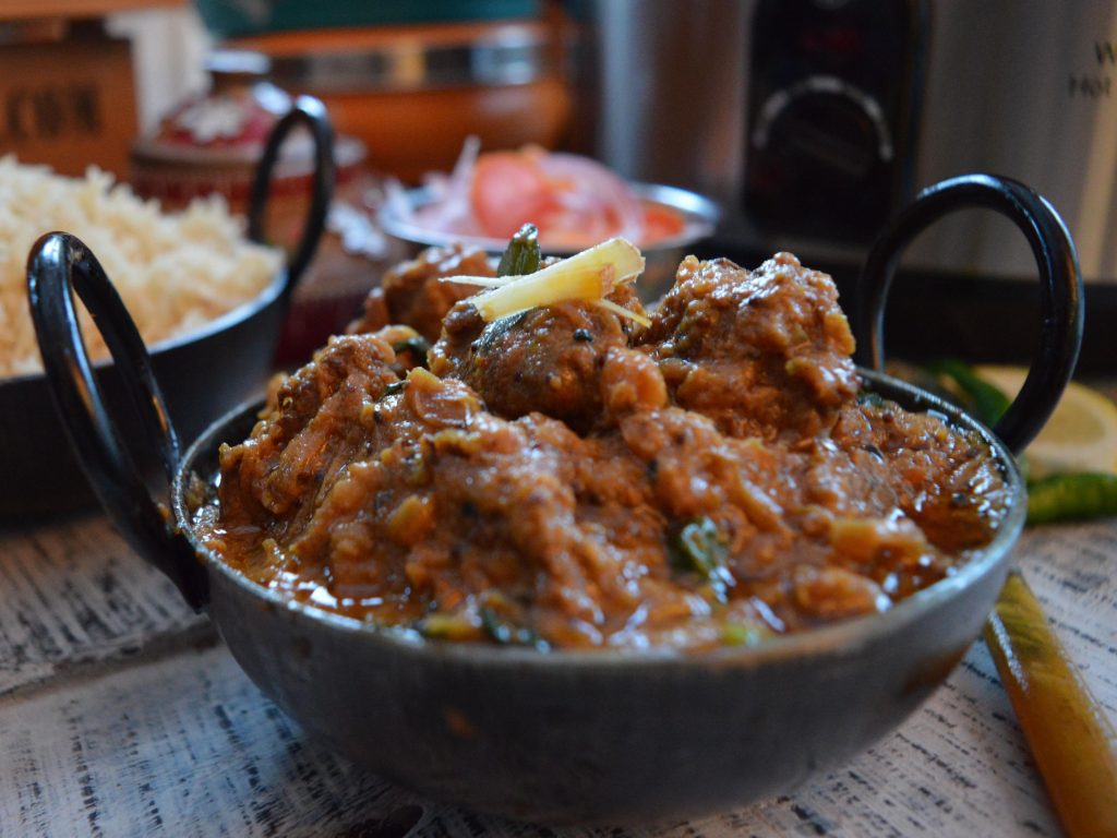 serving dish of lamb with lentil and vegetable