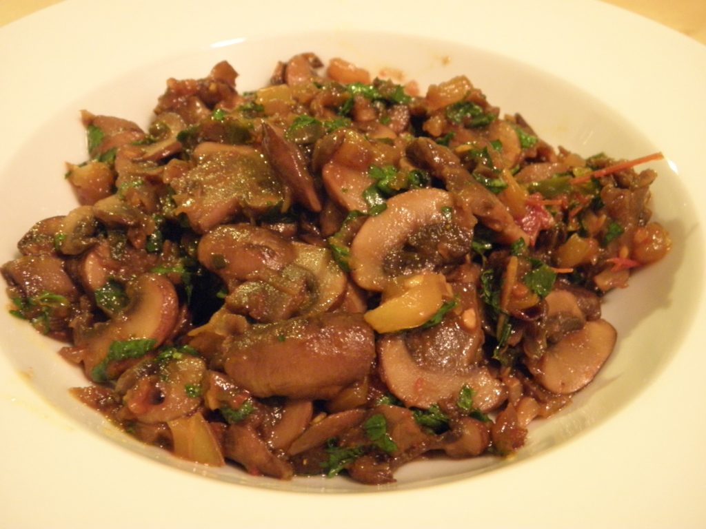 a plate of mushroom pepper fry