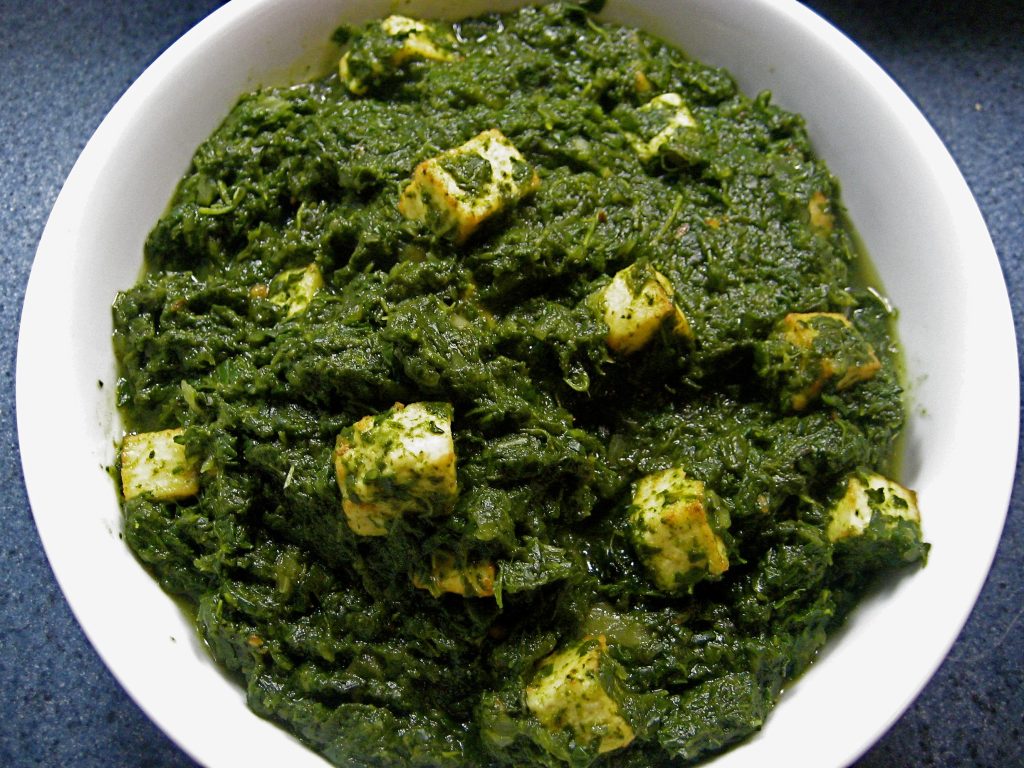 a bowl of palak paneer