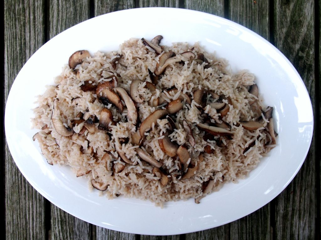 a serving plate of mushroom pulao