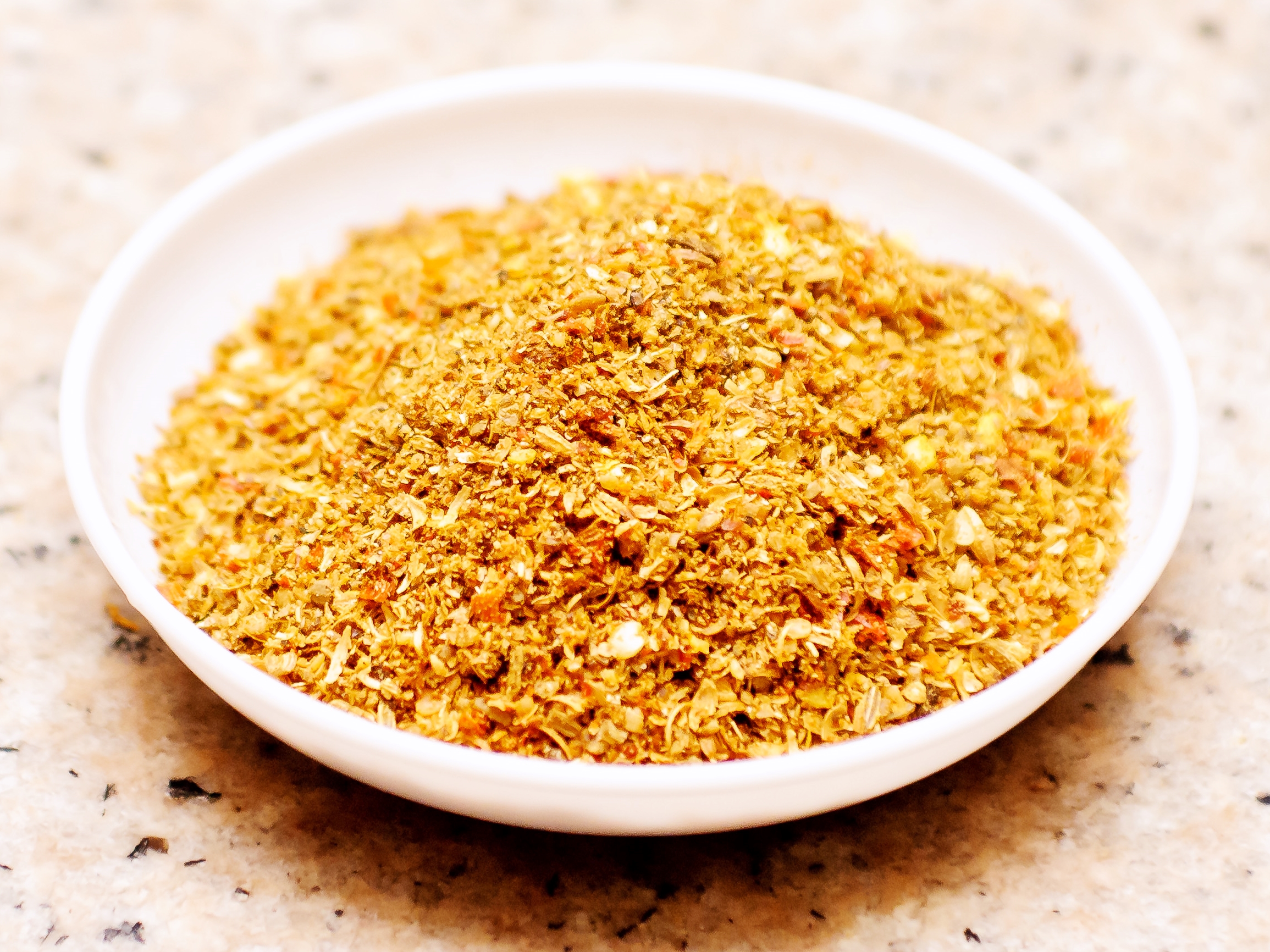 a small dish with sambar masala
