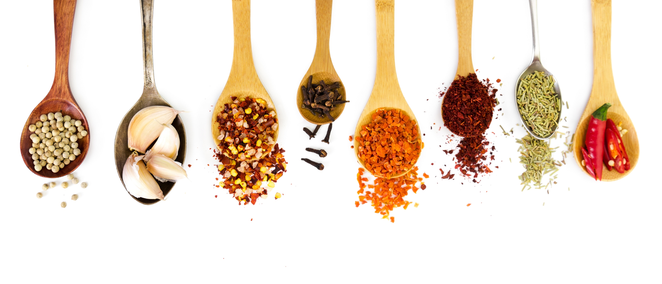spice on wooden spoons