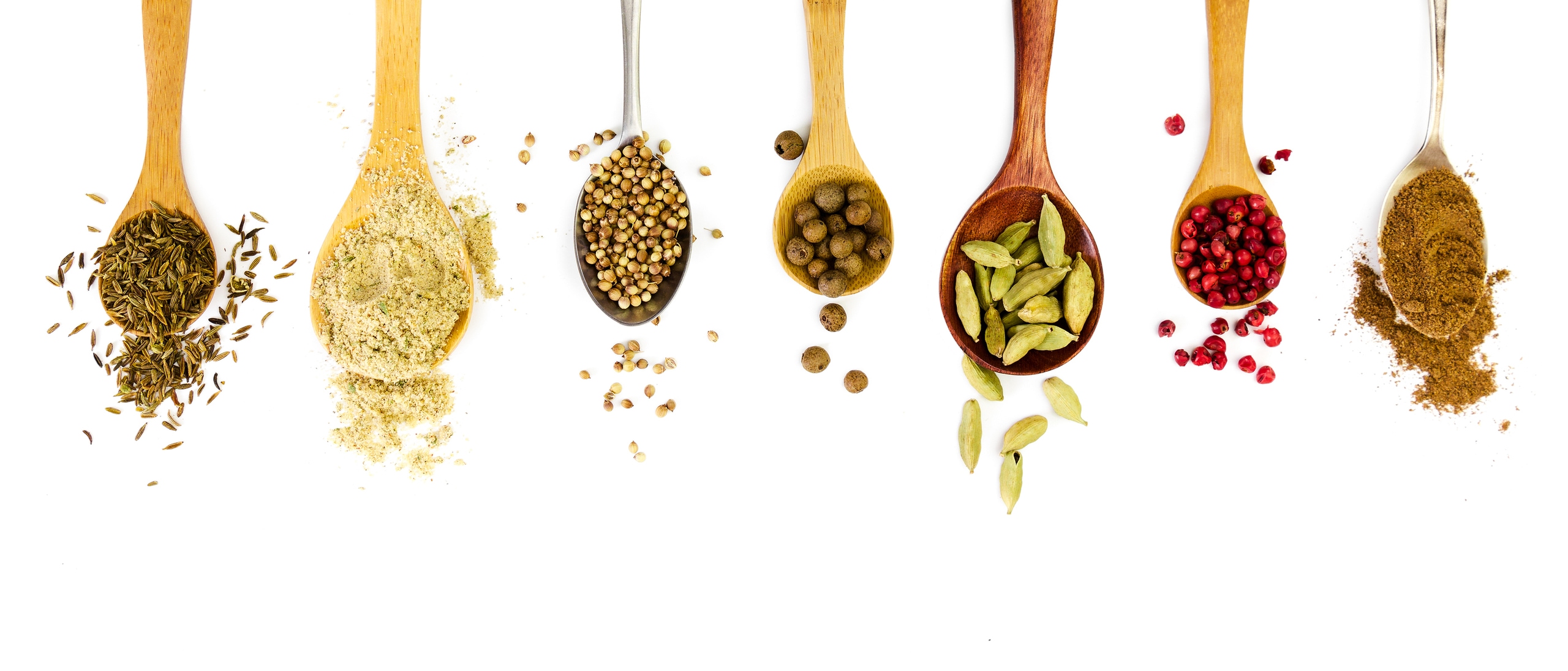 spice on wooden spoons